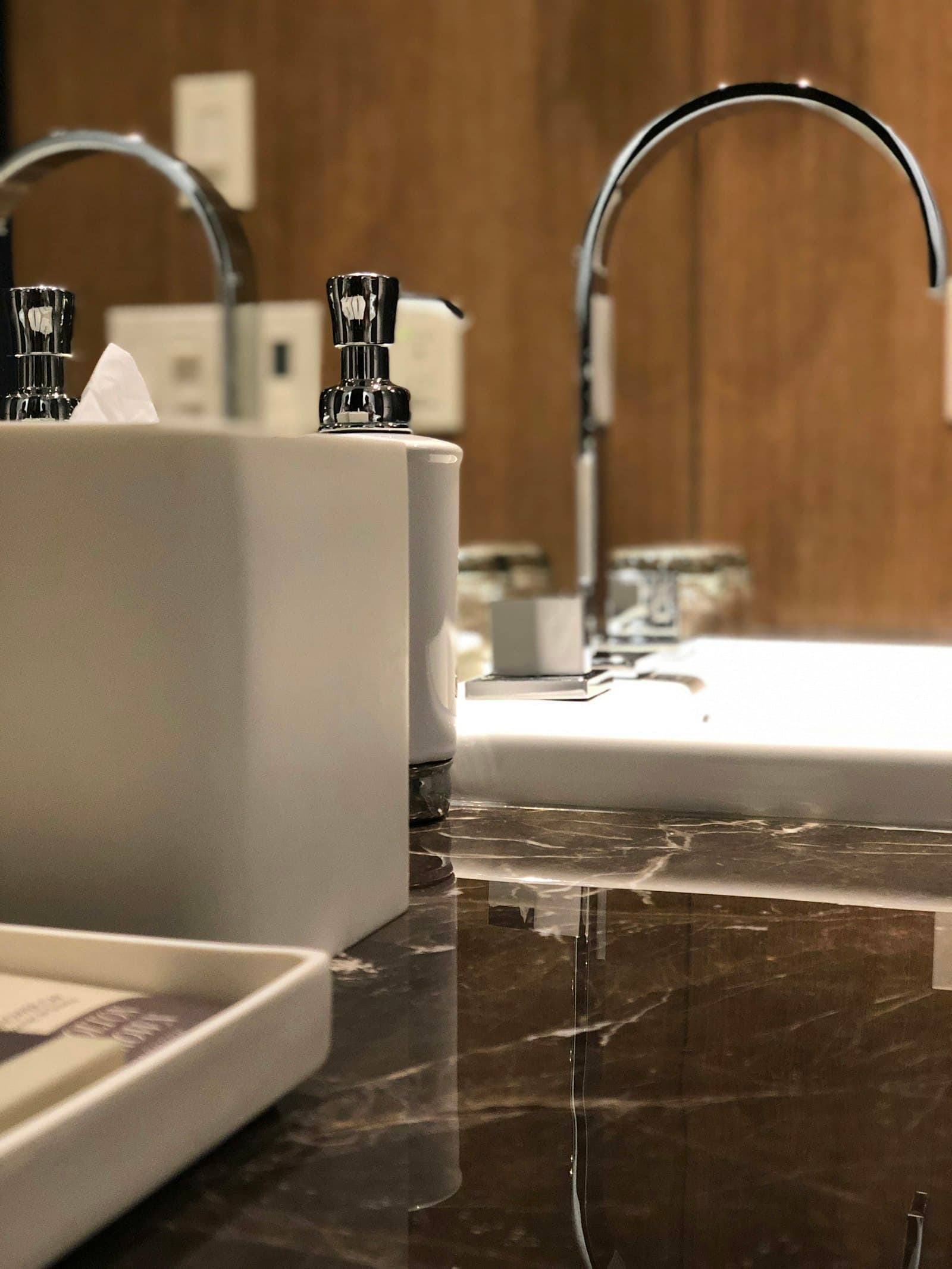 Marble and brass en-suite bathroom detail
